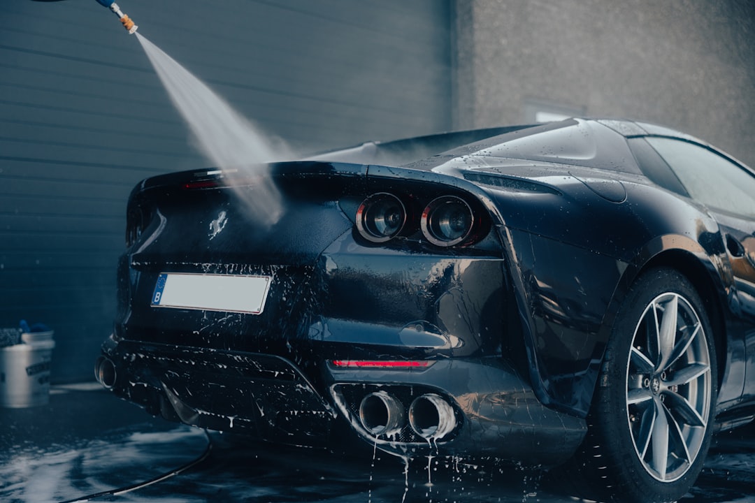 services-04 a-car-being-washed-with-a-high-pressure-washer-ojtodra8sta